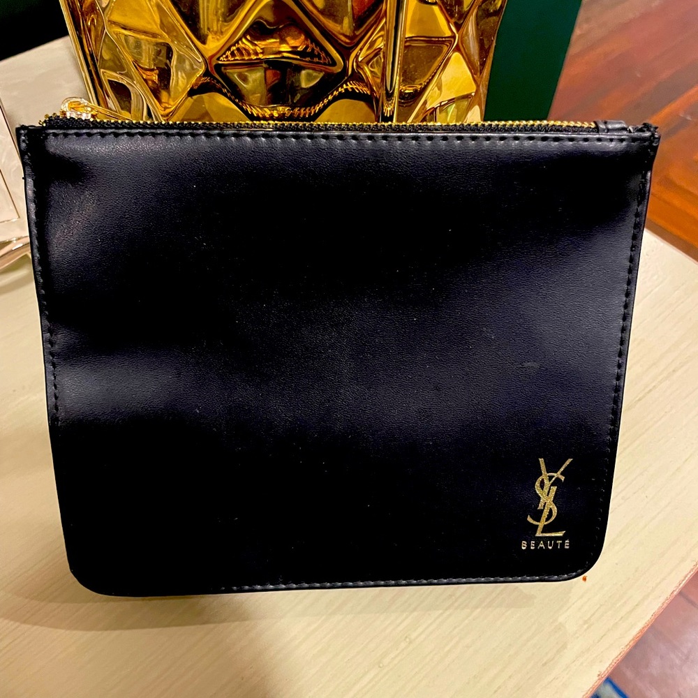 Ysl beauty travel pouch.